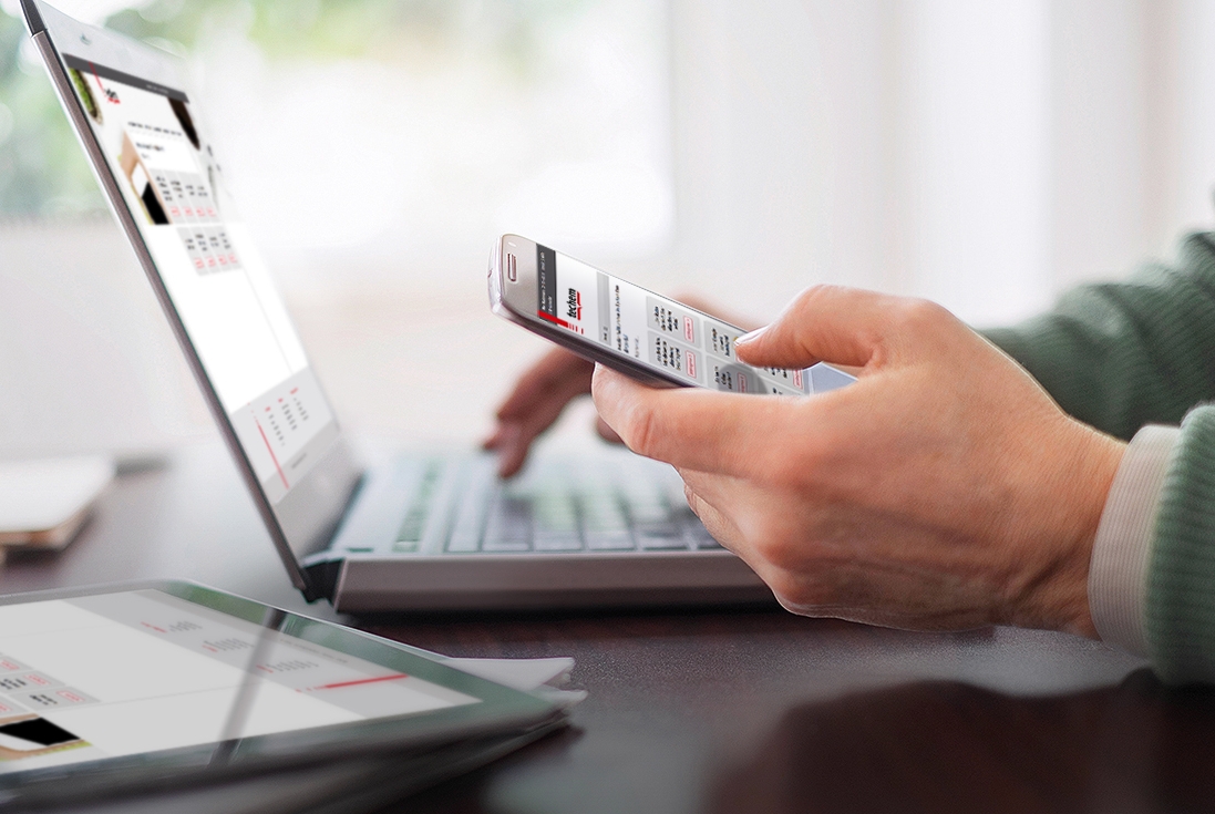 04 Feb 2015 --- Close up of man's hands working at desk with electronic devices --- Image by © Tetra Images/Corbis