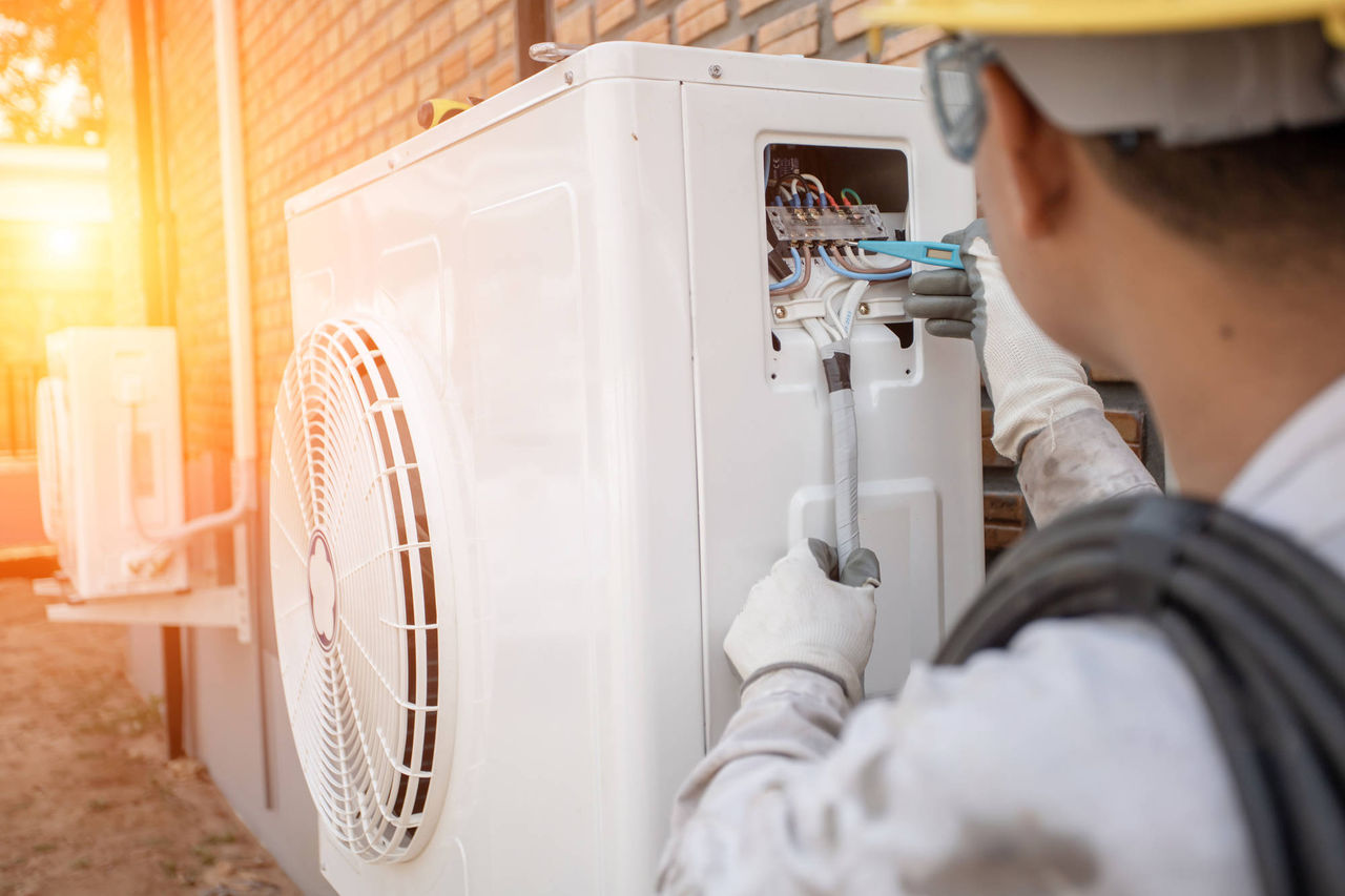 Air Conditioning Technician and A part of preparing to install new air conditioner. Technician vacuum pump evacuates and checking new air conditioner; Shutterstock ID 1745619830; purchase_order: TES 2224-001; job:  Motiv Recherche Contracting ; client: Techem / faust und auge; other: 